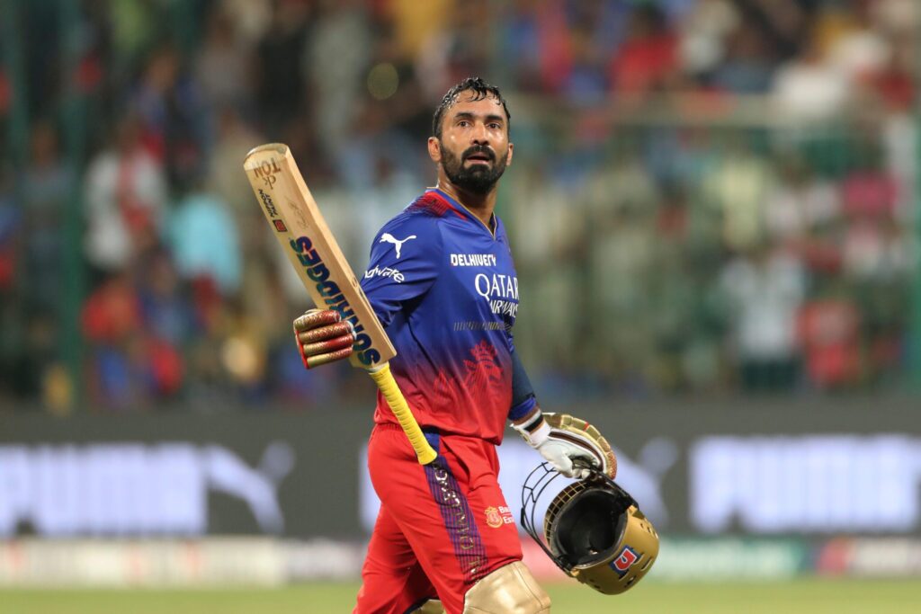 Royal Challengers Bengaluru's Dinesh Karthik acknowledges the crowd as he leaves after being dismissed during the Indian Premier League cricket match between Royal Challengers Bangaluru and Sunrisers Hyderabad in Bengaluru, India, Monday, April 15, 2024.